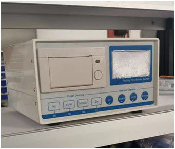 TG-100E Επιστροφική φωτεινή οθόνη LCD Coulomb Ηλεκτρολυτική πολυεπίπεδη μέτρηση πάχους επικάλυψης μετάλλου